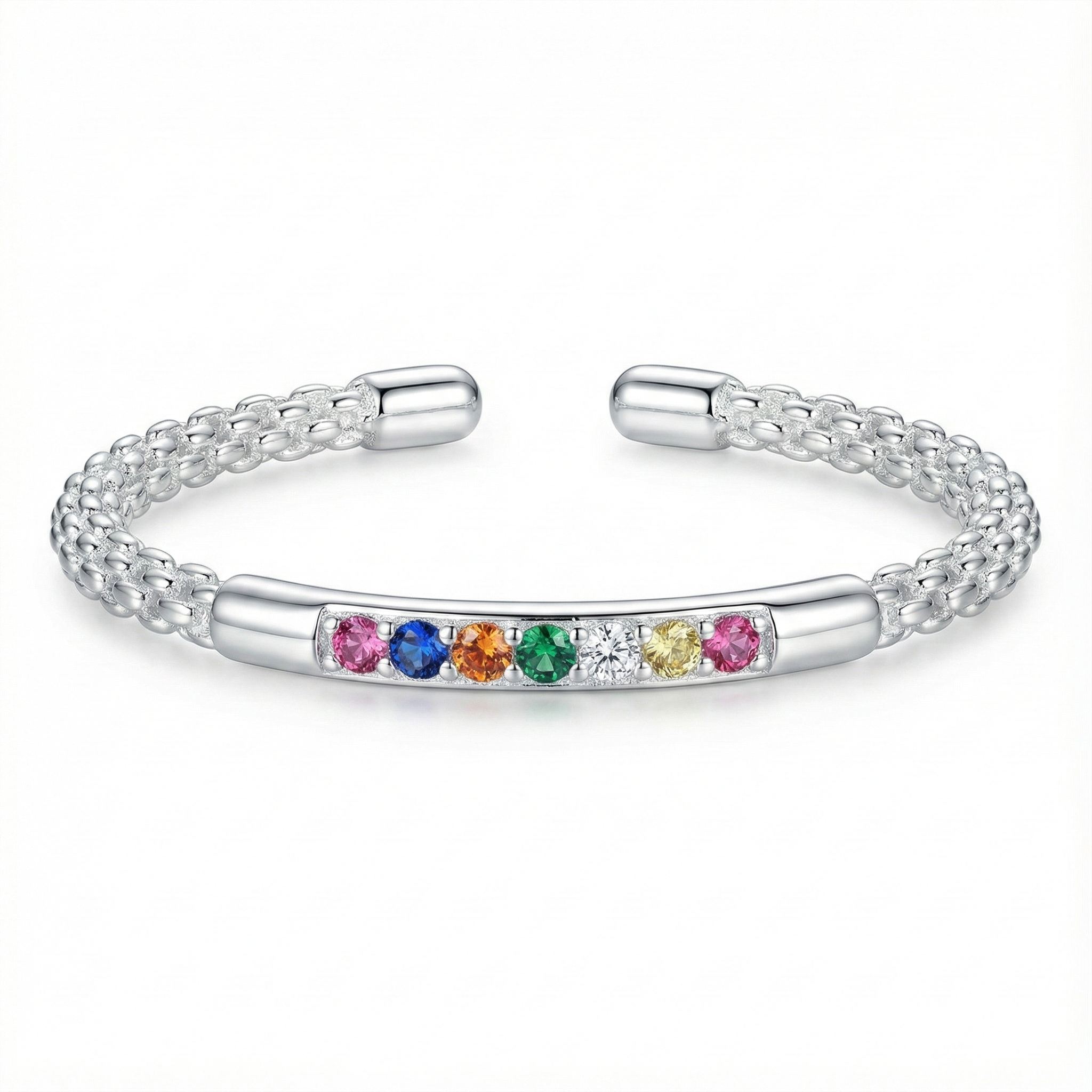 Bague ouverte réglable argentée avec anneau texturé perlé et barrette de pierres zircons multicolores style arc-en-ciel.